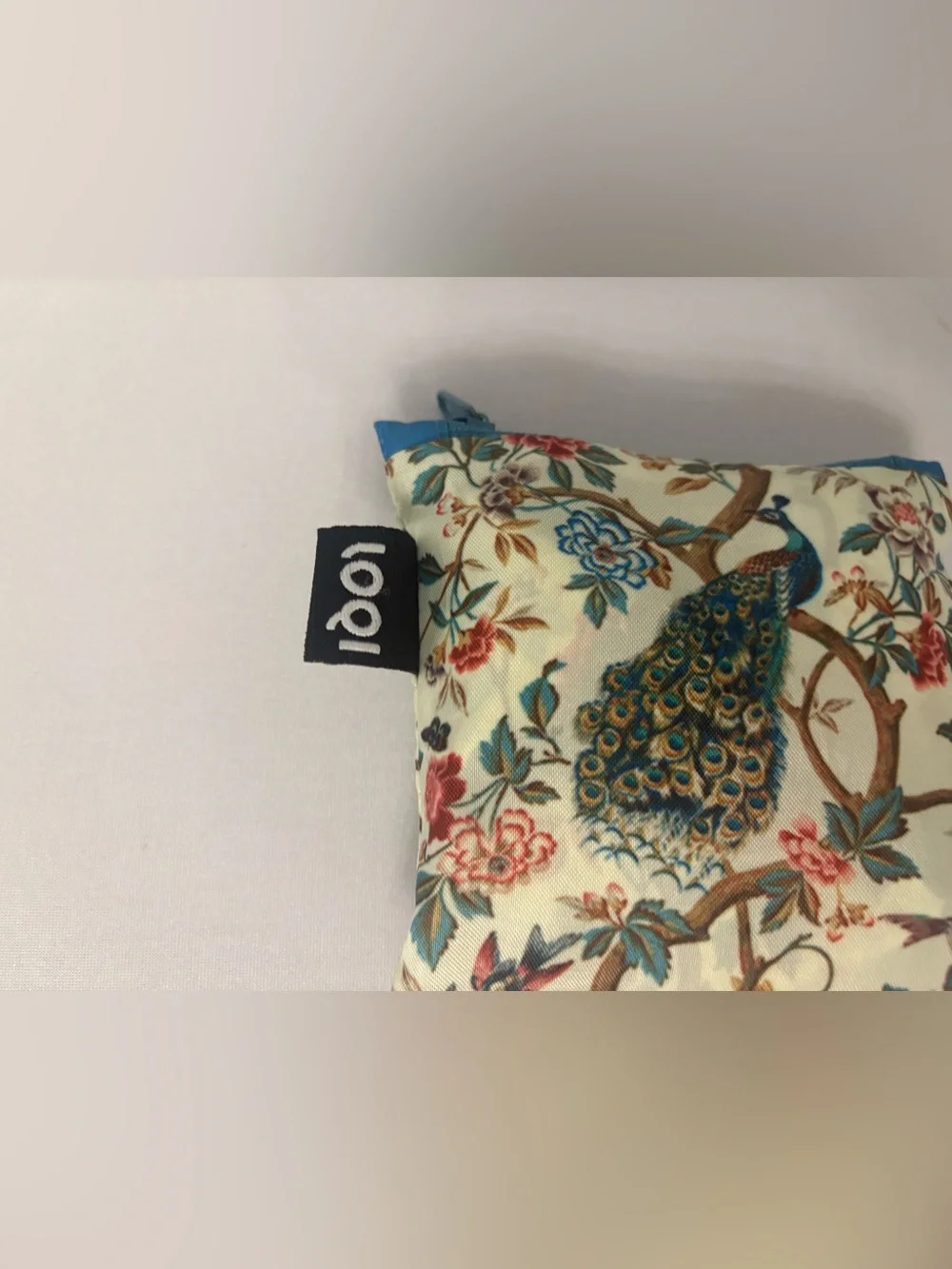 LOQI Peacock Floral Accent Pillow in Cream and Teal